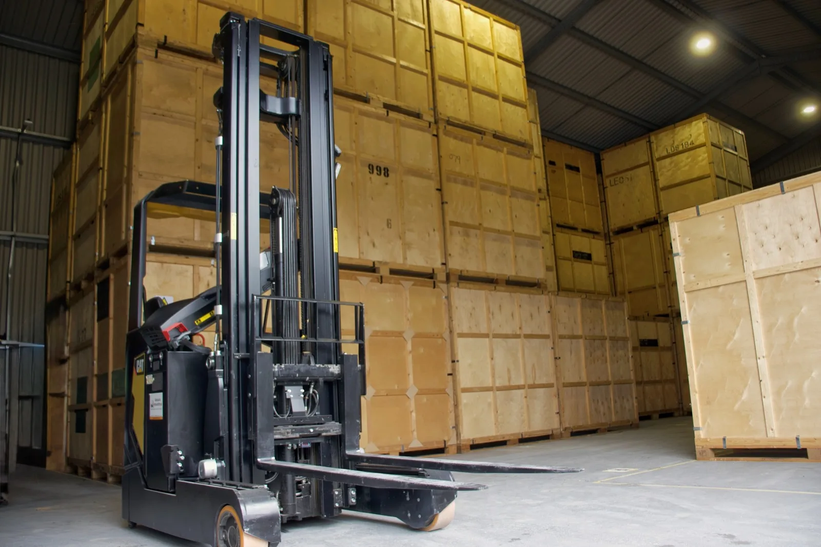 A forklift handling containerised removals storage