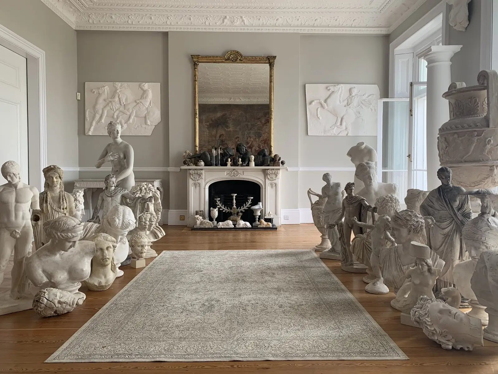 Fine antique relief sculptures on a house move in Cranleigh