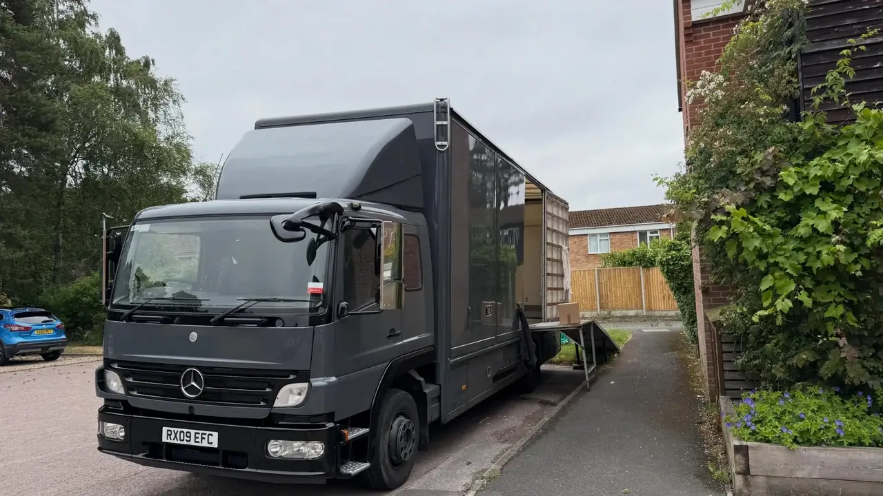 A Wolves Removals lorry on a driveway in Bracknell at the start of a move to West Sussex
