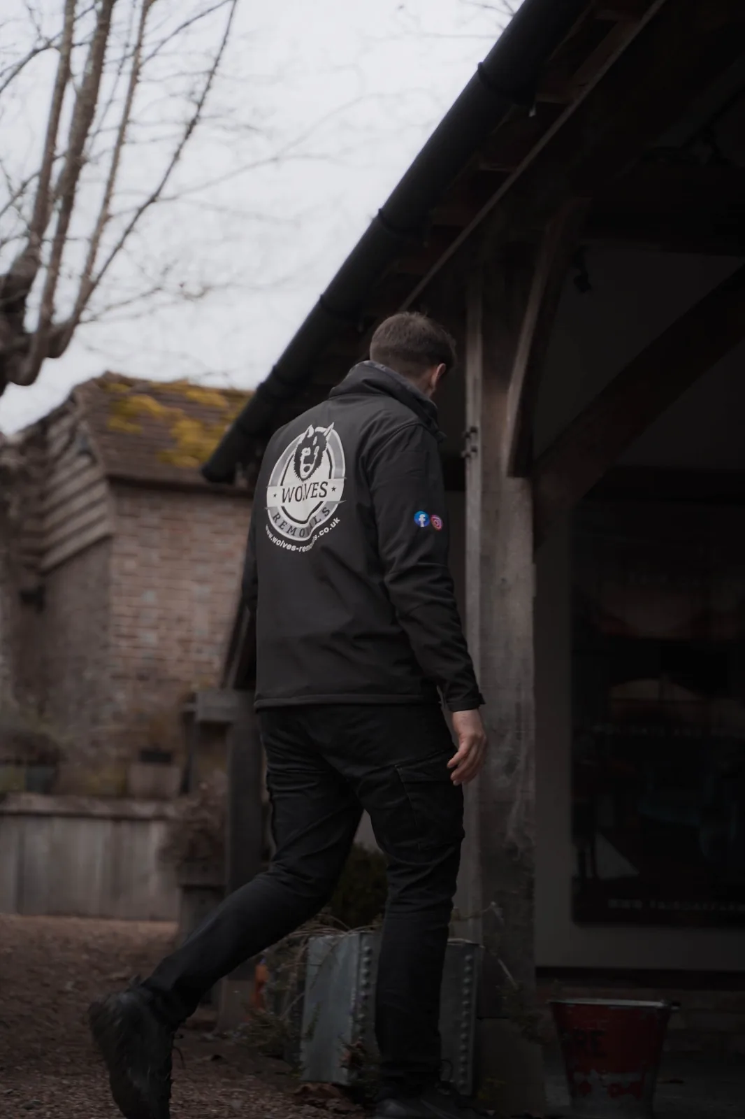 Carrying a packed item into a property, Dorking