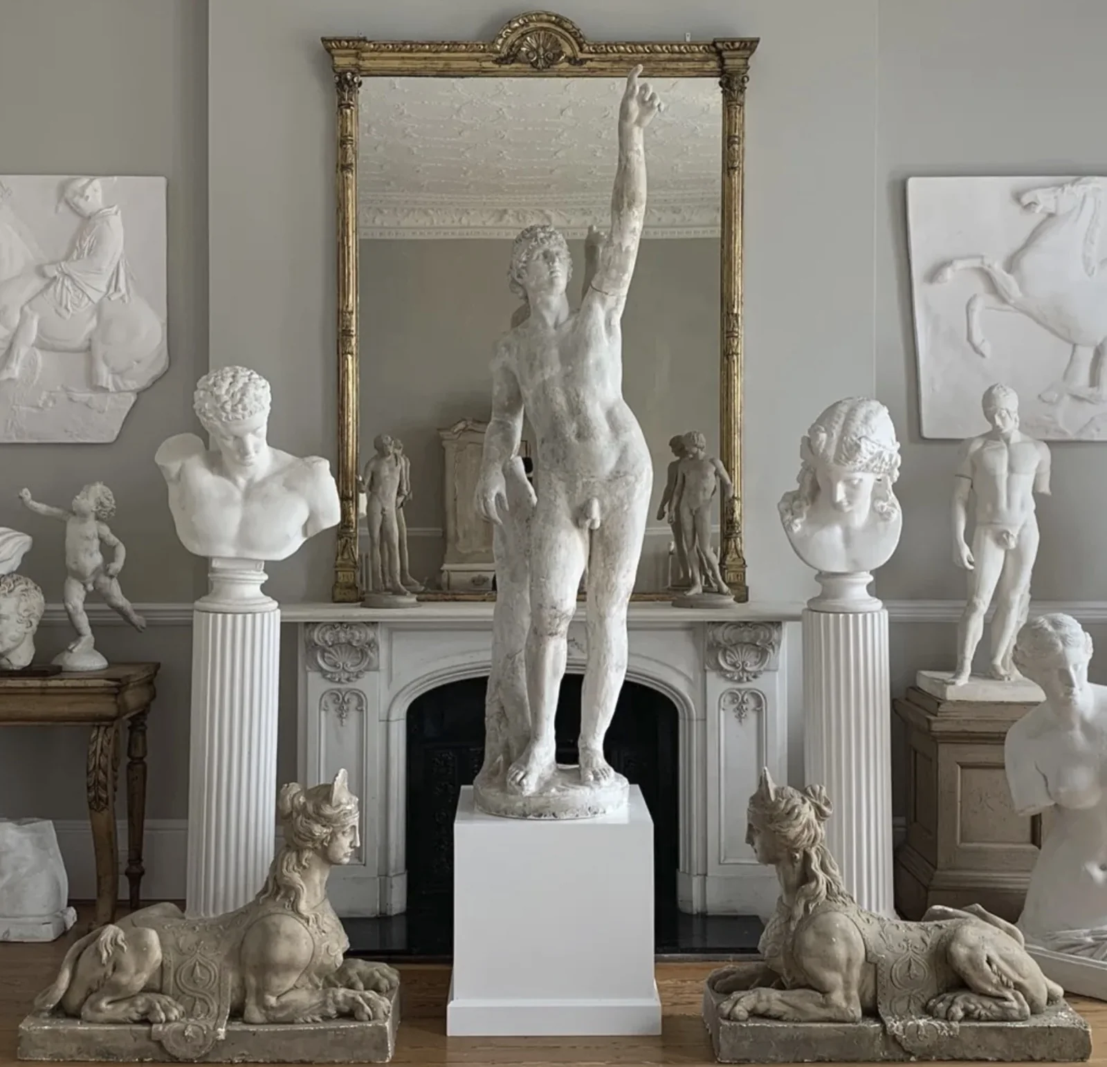 Classical statues, busts and antiques in a grand fine-art collection