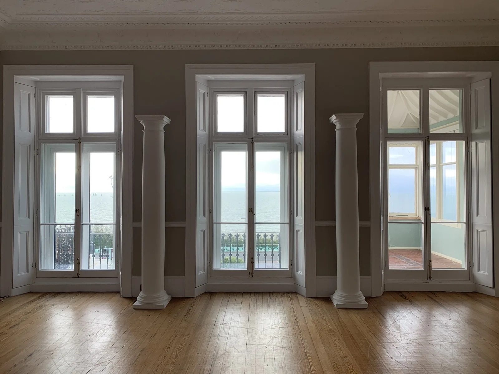 A period drawing room with sea view cleared for a move