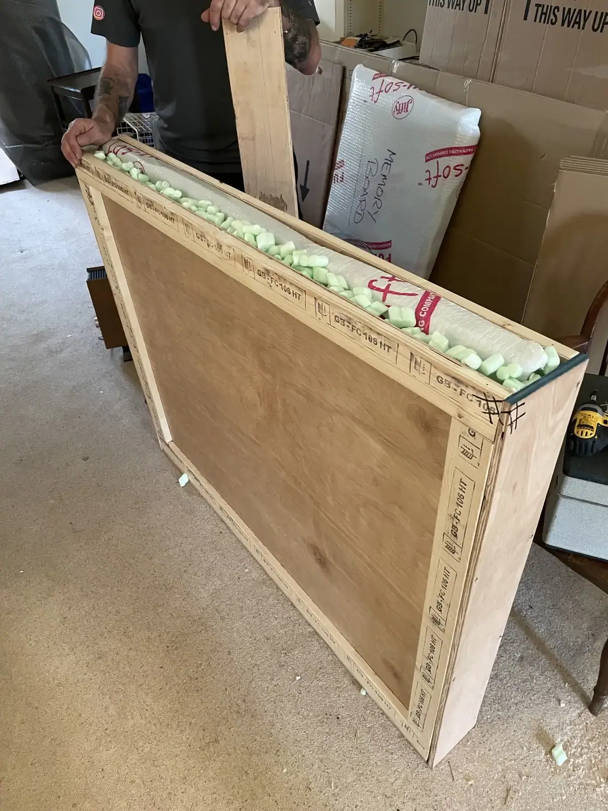 Framed mirror packed in a wooden crate in Kent