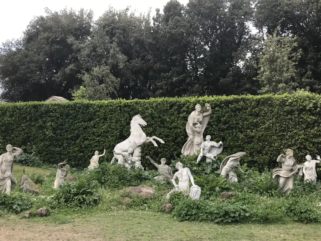 Garden with classical horse and figure statues — a Kent removal