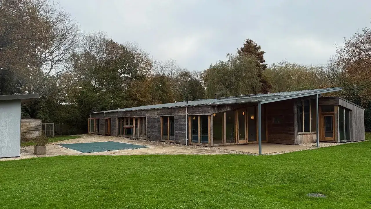 A modern timber-clad country bungalow near Horsham on the day of a six-day house move
