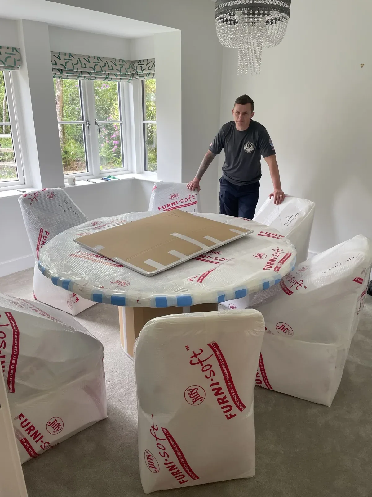Mover with wrapped dining set