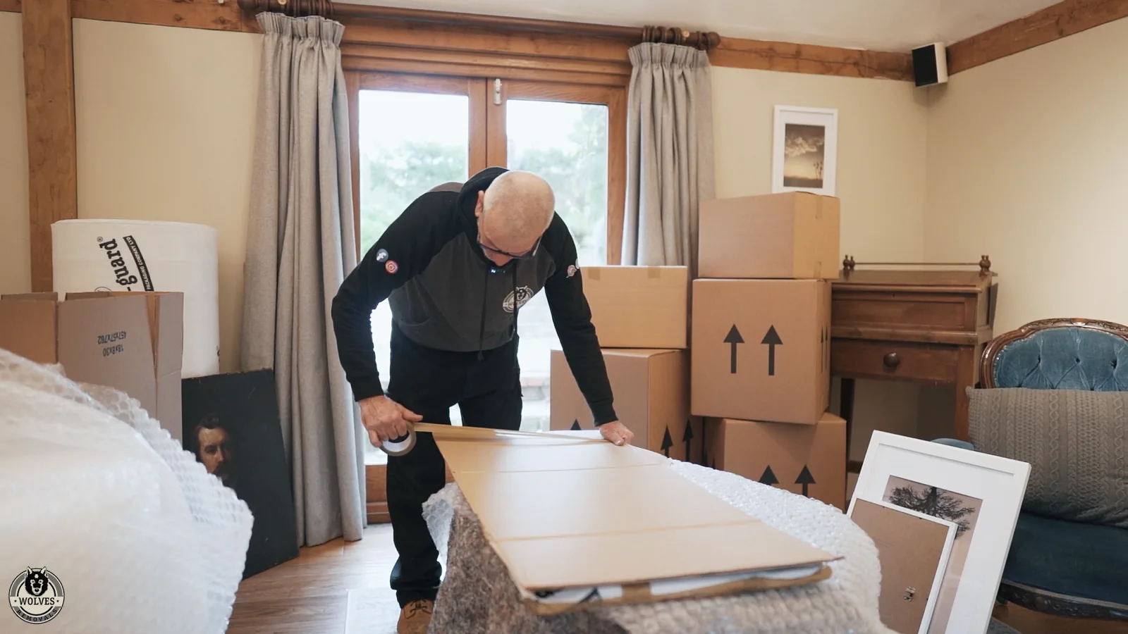 Packing up furniture and boxes at home for a Worthing removal
