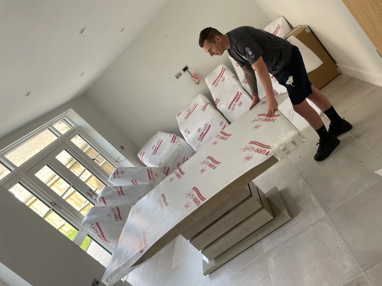 Packing items in loft bedroom