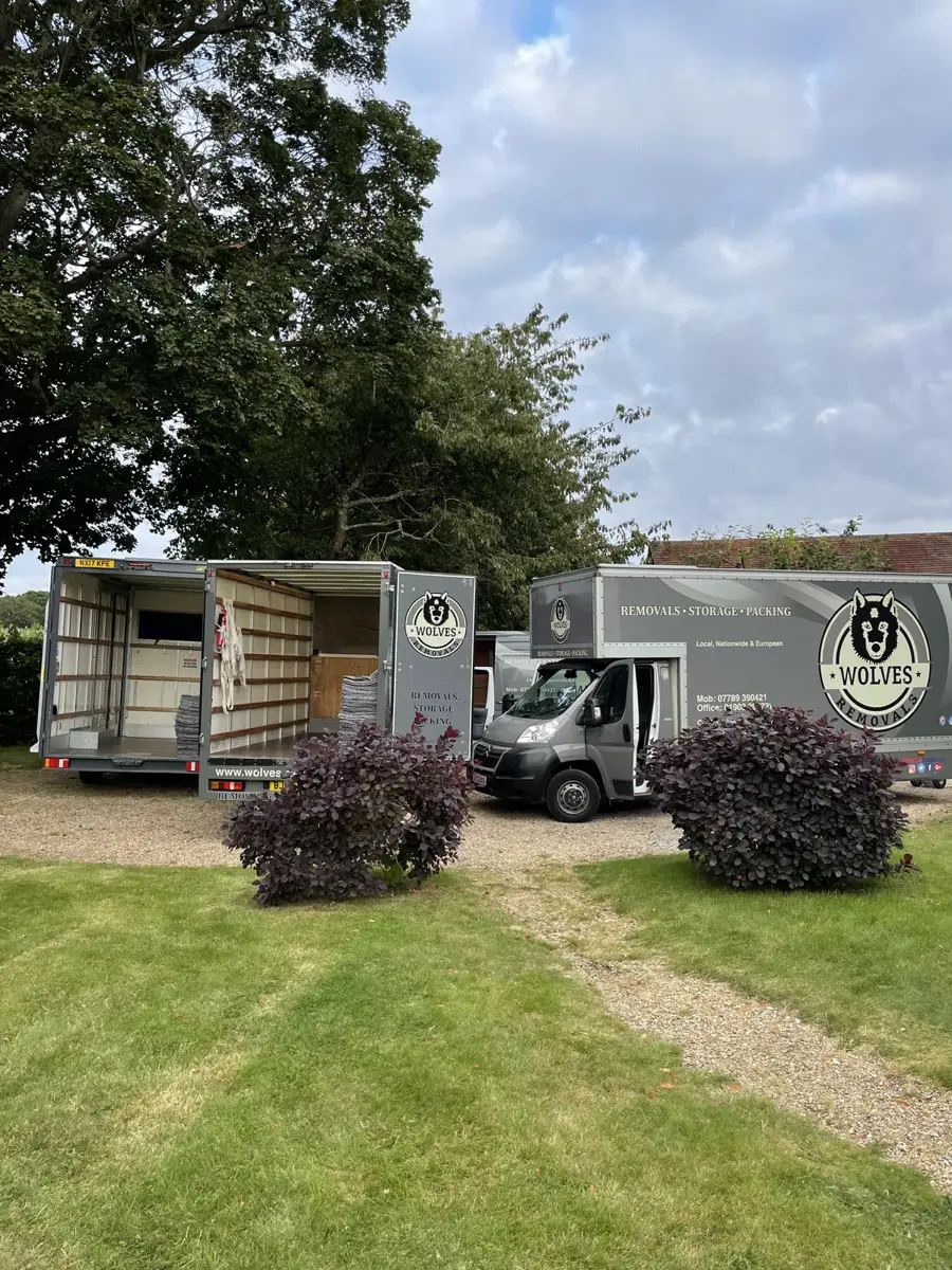 A Wolves Removals HGV on a driveway ready to load