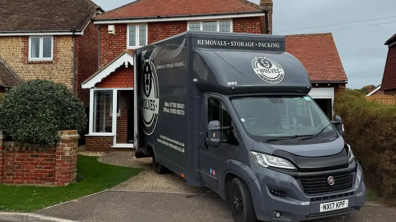 A Wolves Removals lorry outside a house on a two-day removals and storage move to Selsey