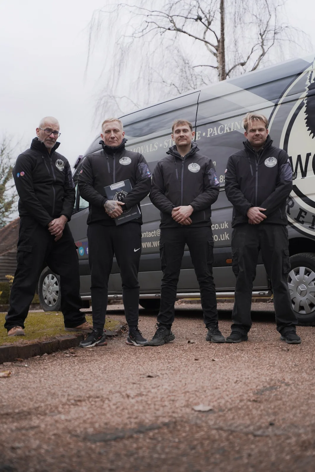 Wolves Removals crew team photo in front of a van