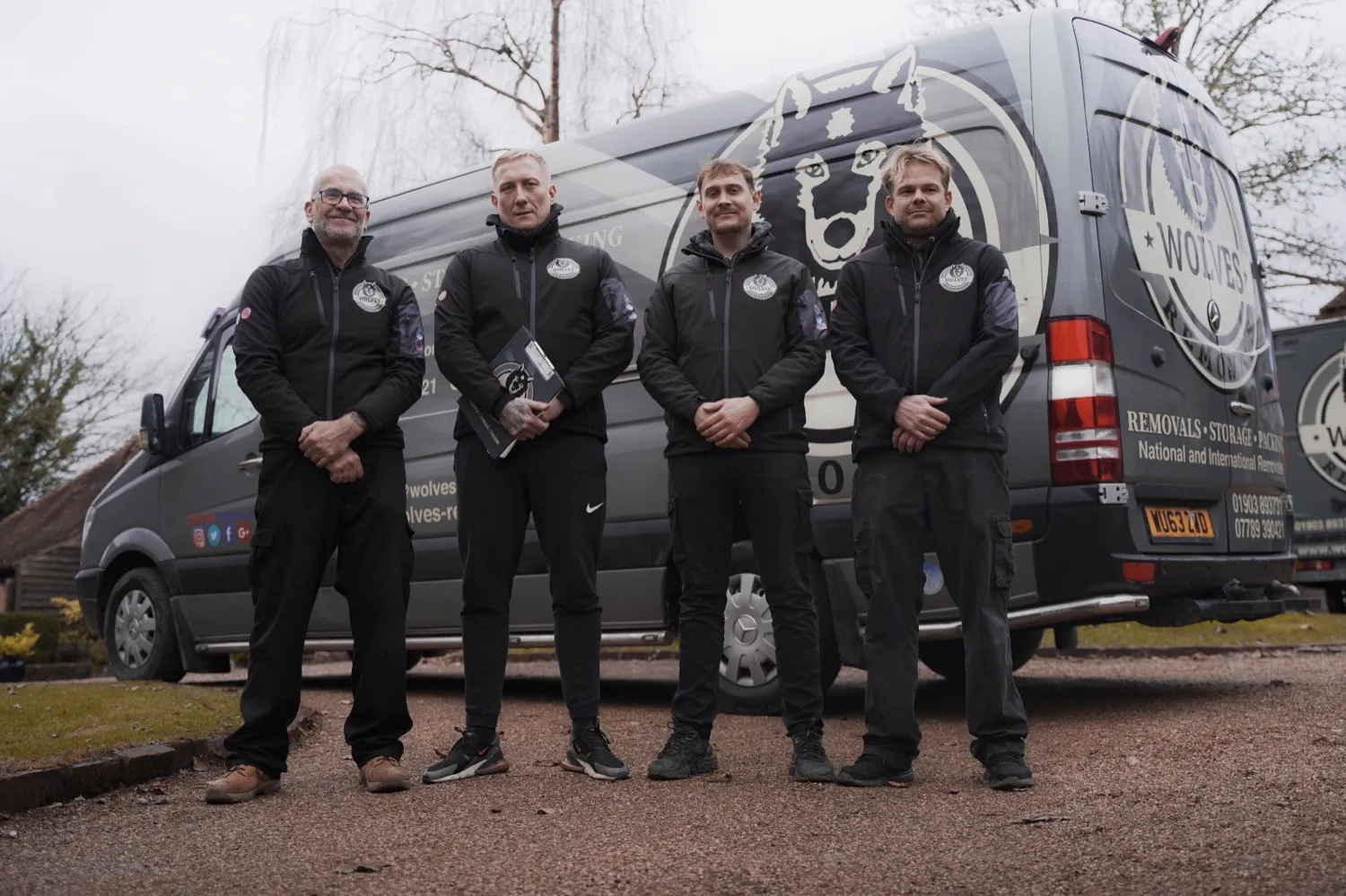 The Wolves Removals team with their fleet of vans in Sussex