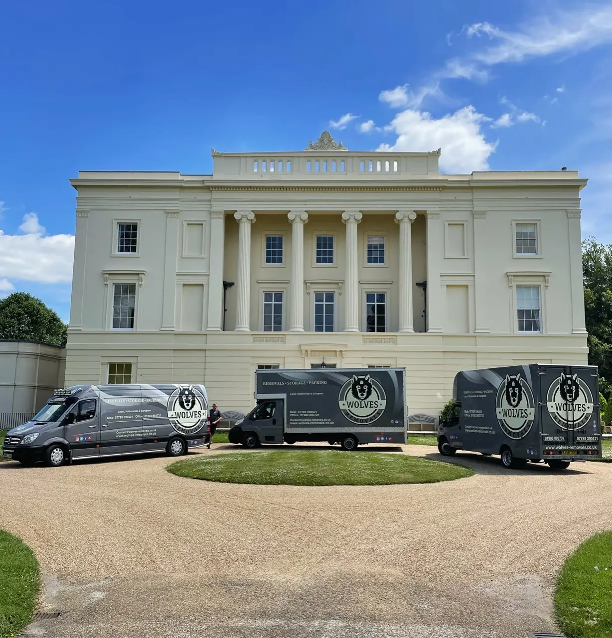 Wolves Removals vans at a grand Sussex country house